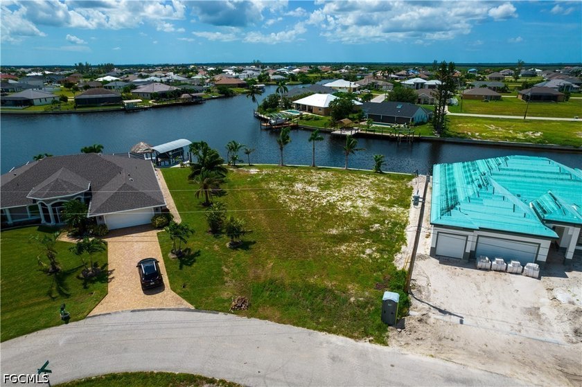 This PREMIER lot is on a HUGE intersecting canal with a - photo 8