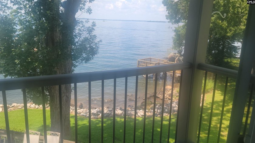 PRICE REDUCED...WELCOME TO SPENCES POINT ON LAKE MURRAY. Proud - photo 7