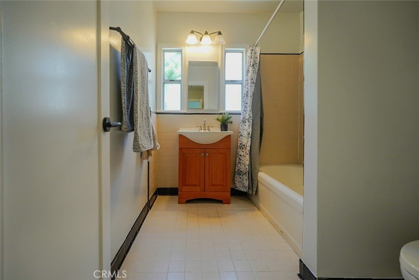Welcome to this charming 2-bedroom, 1-bath home nestled in the - photo 13