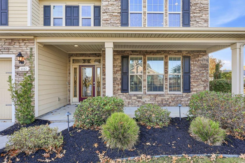 Discover exceptional coastal living in this immaculate 4-bedroom - photo 2