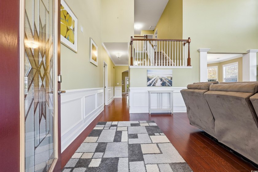 Discover exceptional coastal living in this immaculate 4-bedroom - photo 3