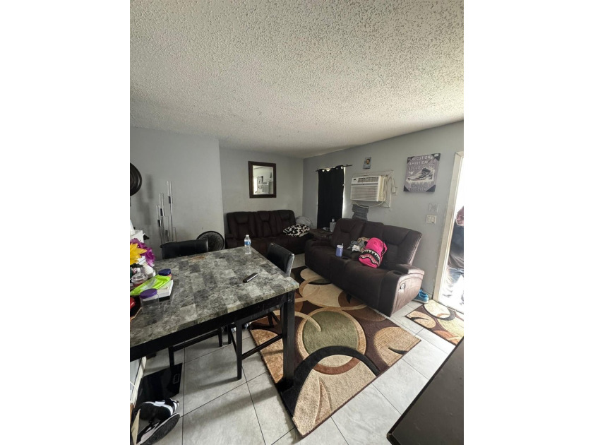 *Charming and well-maintained duplex unit now available! This - photo 2