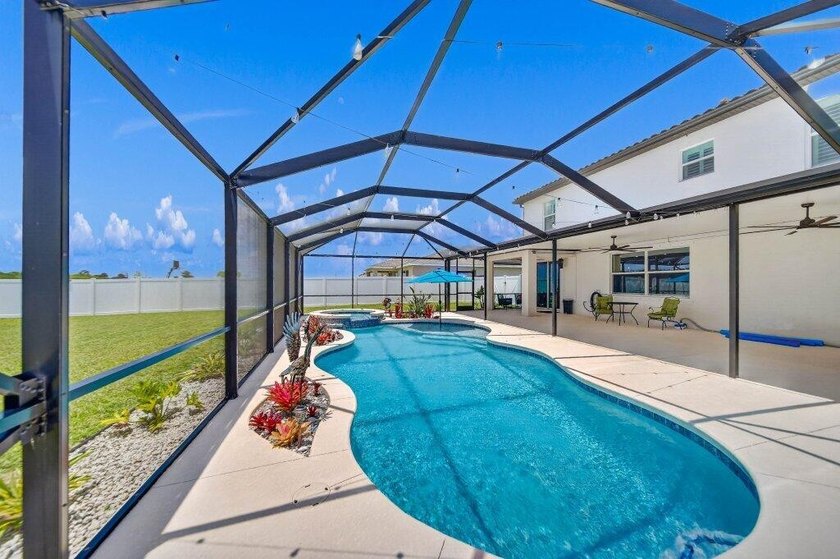 A premium Copper Creek Lennar home offering 5 bedrooms plus a - photo 6