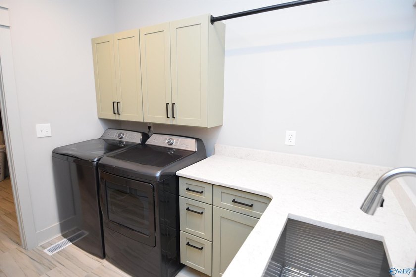 Experience lake living at The Reserve in this beautifully - photo 16
