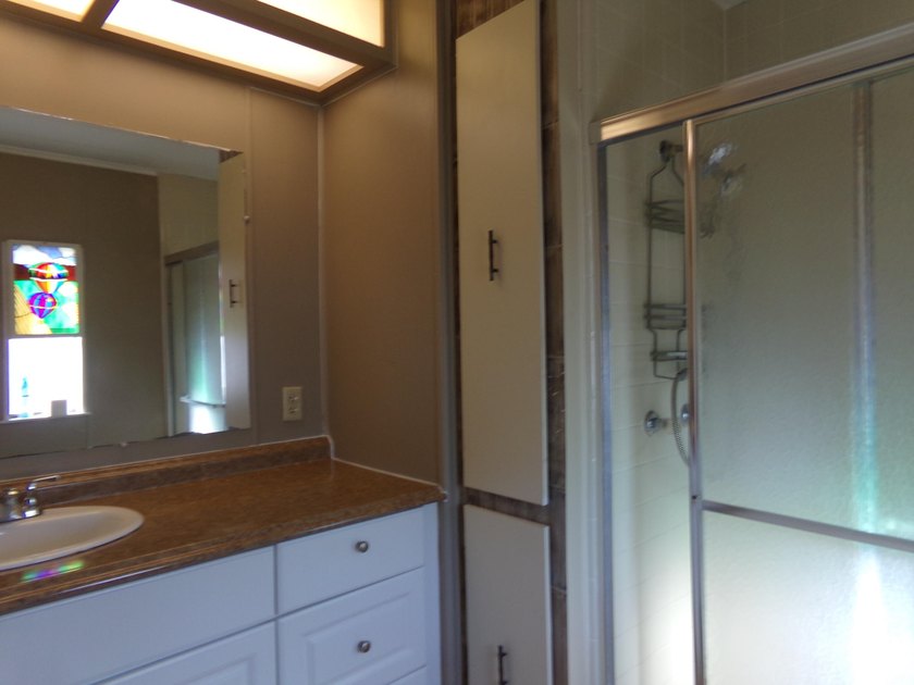 Welcome to this charming 3-bedroom, 2-bathroom manufactured home - photo 20
