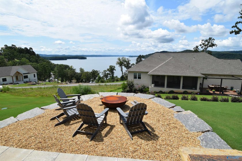 Experience lake living at The Reserve in this beautifully - photo 32