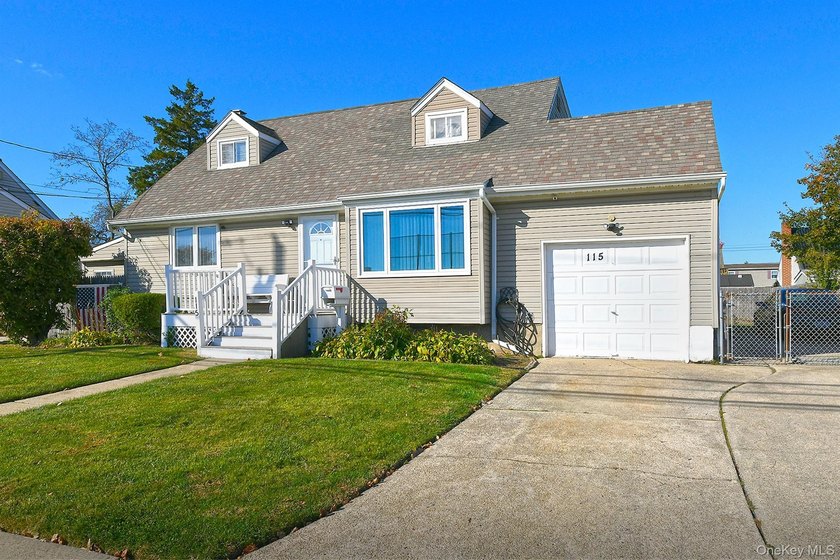 Welcome to 115 Old Farmingdale Road, West Babylon. Charming and - photo 3