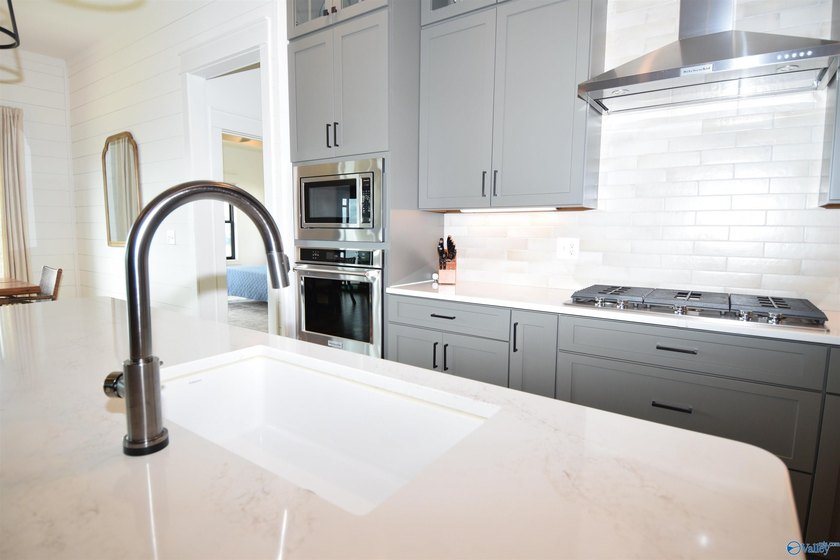 Experience lake living at The Reserve in this beautifully - photo 37