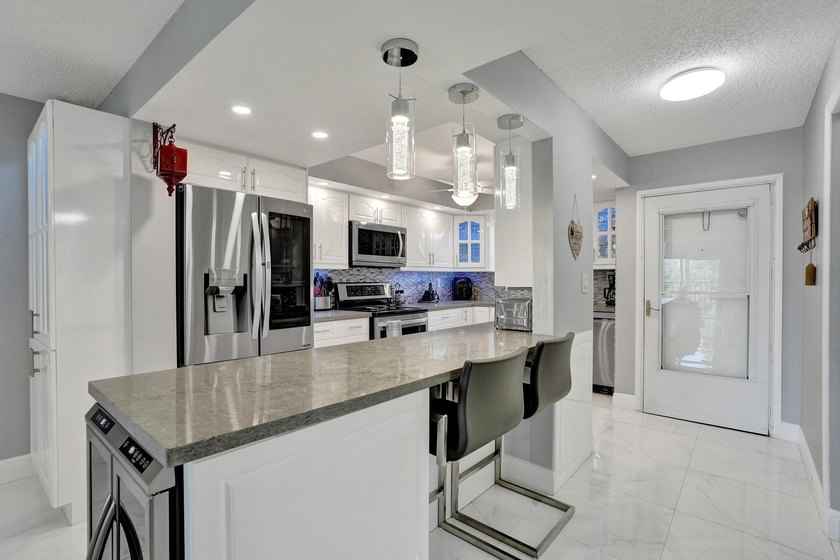Experience effortless South Florida living in this fully - photo 3