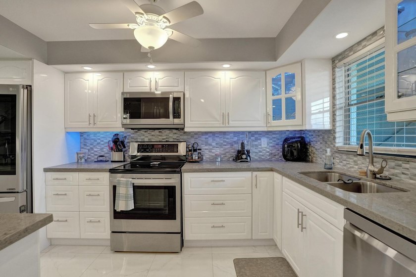 Experience effortless South Florida living in this fully - photo 7