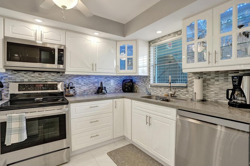 Experience effortless South Florida living in this fully - photo 8
