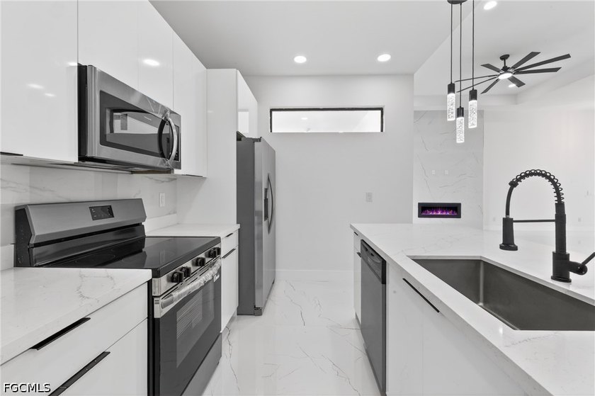 Brand-new modern construction featuring 4 bedrooms, 3 full - photo 8