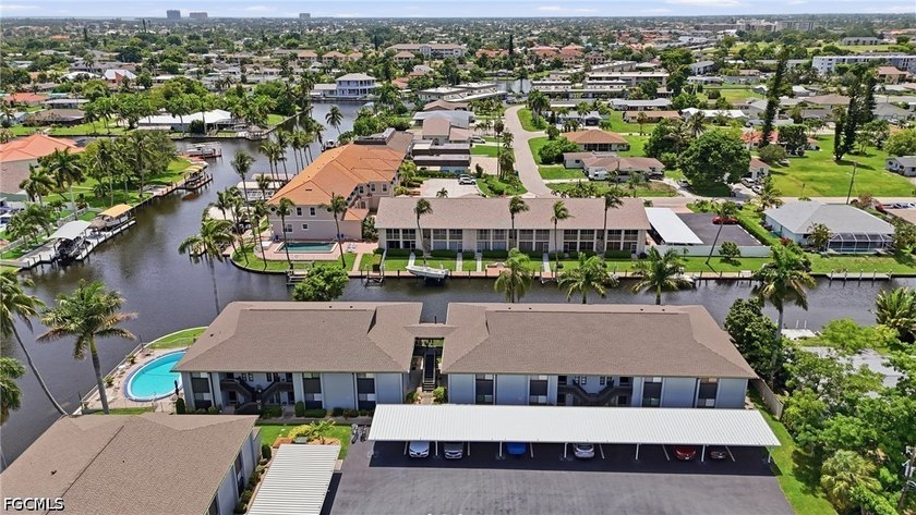 Waterfront living meets ultimate peace of mind! This immaculate - photo 3