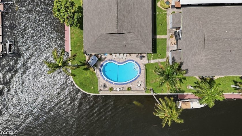Waterfront living meets ultimate peace of mind! This immaculate - photo 4