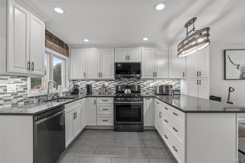 Welcome home to this beautifully maintained Colonial located in - photo 8