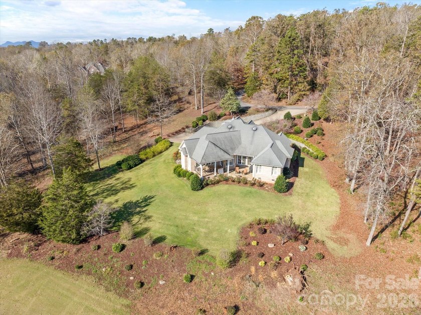 This stunning home overlooks the 17th green at Cleghorn Golf - photo 41