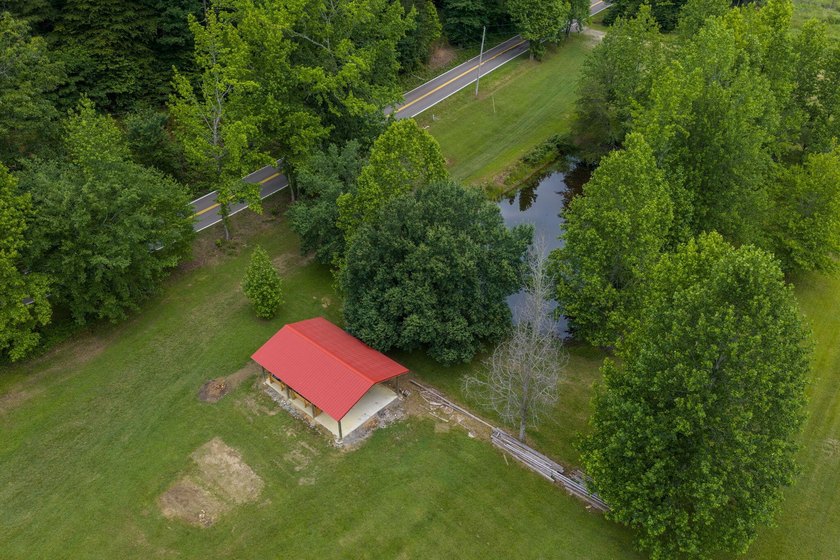 Own approximately 10 unrestricted acres with over 900 feet of - photo 28