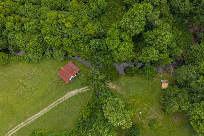 Own approximately 10 unrestricted acres with over 900 feet of - photo 31