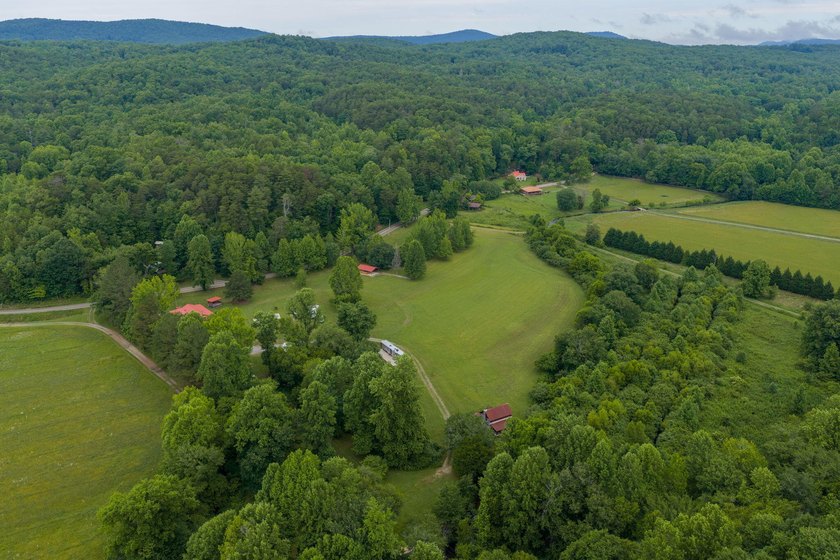 Own approximately 10 unrestricted acres with over 900 feet of - photo 32