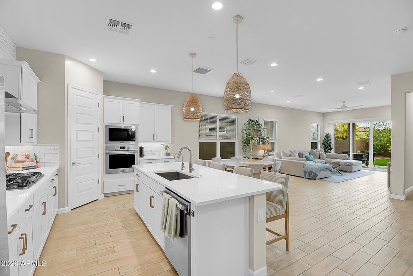 Light-filled and beautifully maintained, this home has high - photo 3