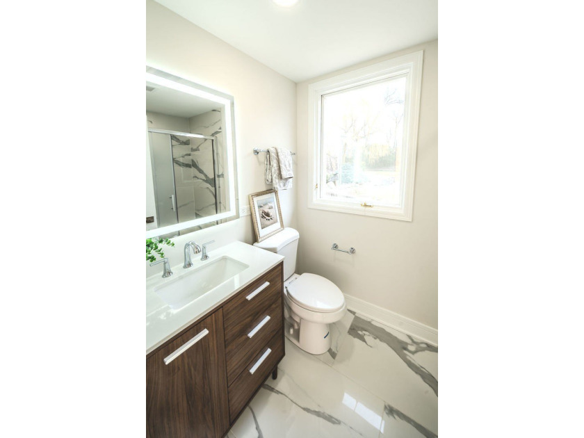 Step into style and space with this beautifully rehabbed brick - photo 22