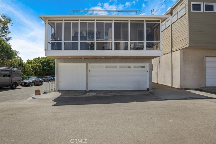 Perched high on a corner lot in Manhattan Beach's desirable Sand - photo 27