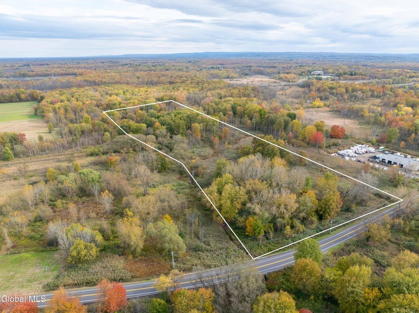 Discover 17.37 wooded acres of commercially zoned land in the - photo 3