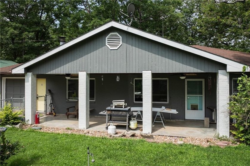 Welcome to this charming 3-bedroom, 2-bath home nestled near - photo 2