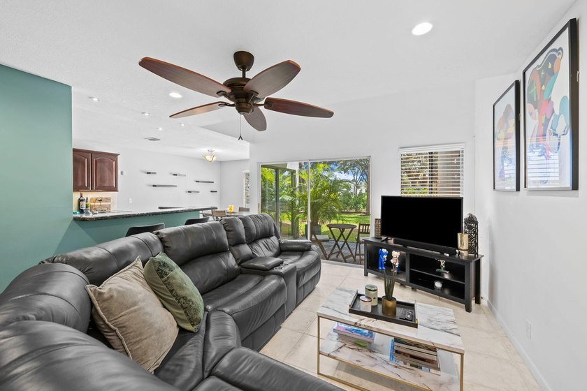 Nestled in the heart of Boca Raton, this two story townhome on a - photo 4