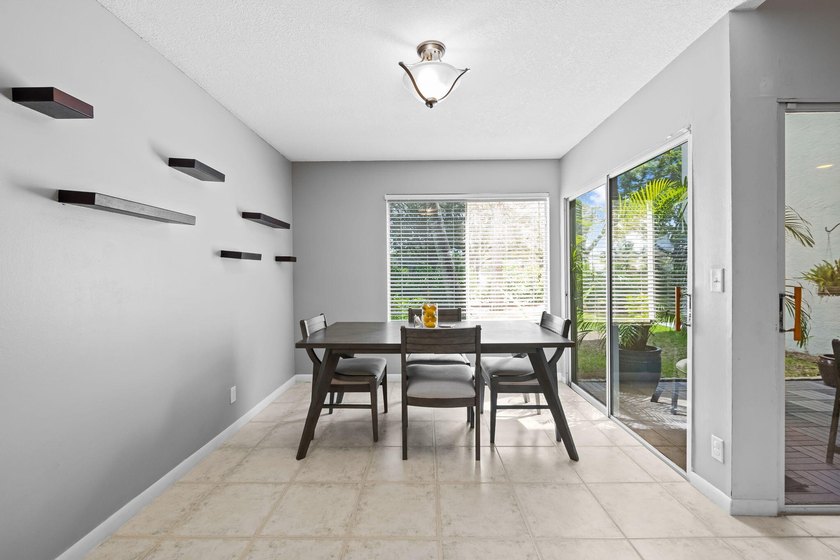 Nestled in the heart of Boca Raton, this two story townhome on a - photo 6