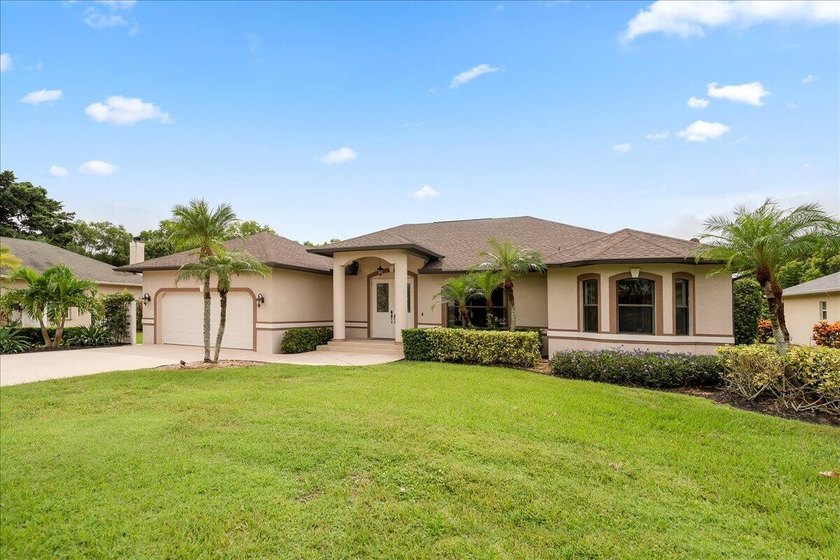 Come see this hidden 4/2/2 with a waterfront pond view in the - photo 6