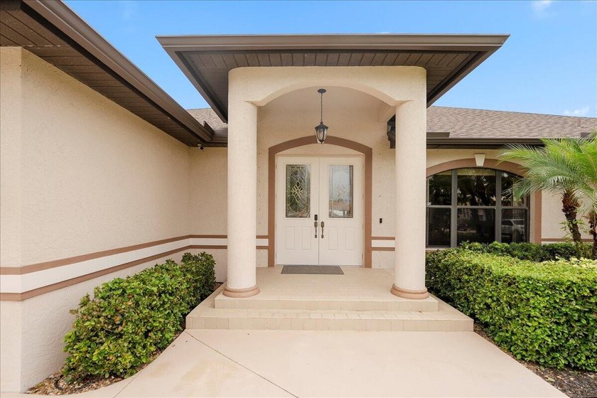 Come see this hidden 4/2/2 with a waterfront pond view in the - photo 7