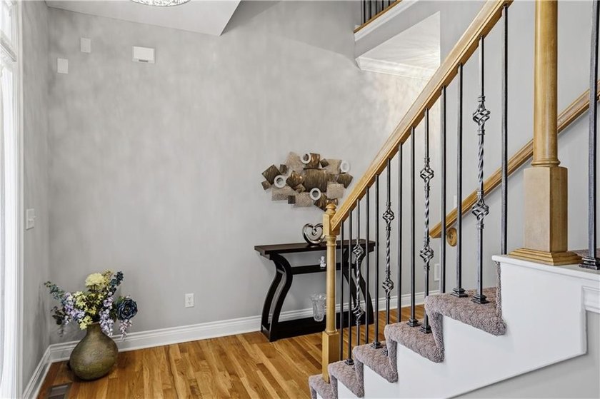Welcome to this beautifully designed 4-bedroom, 4.5-bath home - photo 3