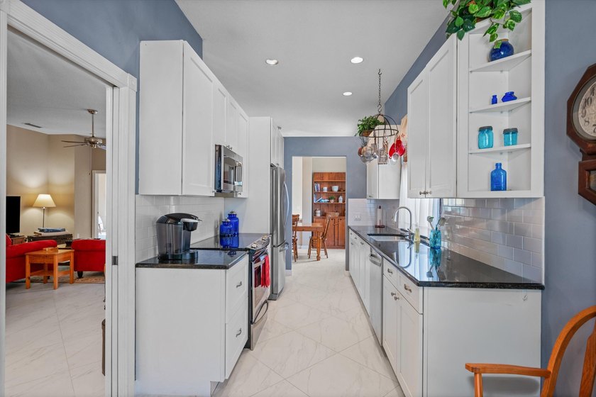 Located in The Hamptons at Maplewood-one of Jupiter's most - photo 13