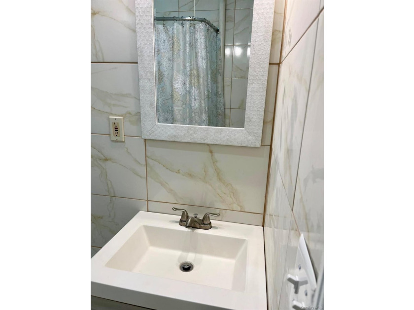 Welcome to this well maintained and updated 2-unit brick home - photo 12