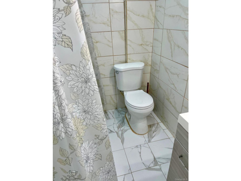 Welcome to this well maintained and updated 2-unit brick home - photo 13