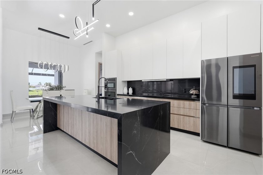 Experience modern waterfront living in this beautifully designed - photo 10