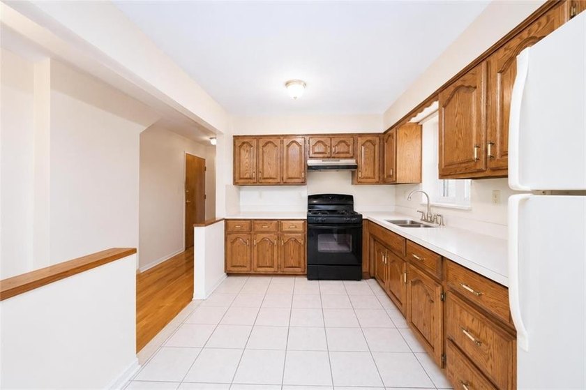 Welcome to this spacious legal 2-family semi-detached brick home - photo 22