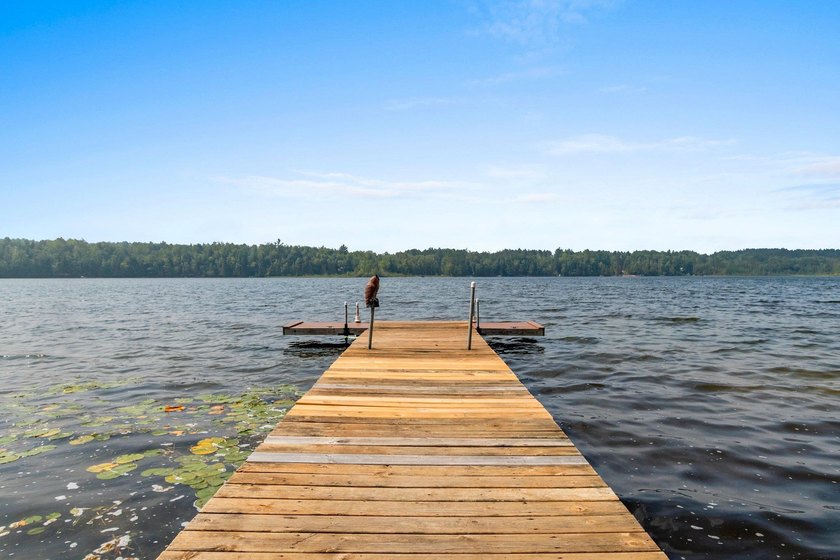 Experience true Northwoods living in this beautiful full log - photo 2