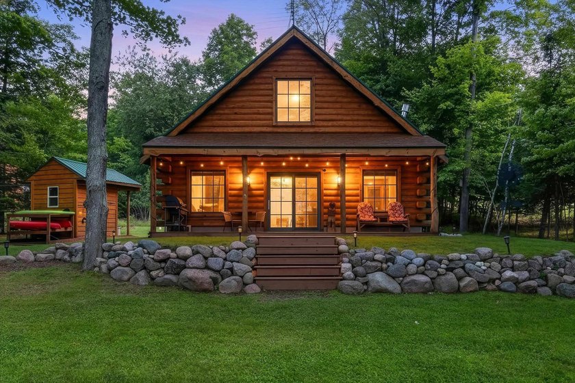 Experience true Northwoods living in this beautiful full log - photo 5
