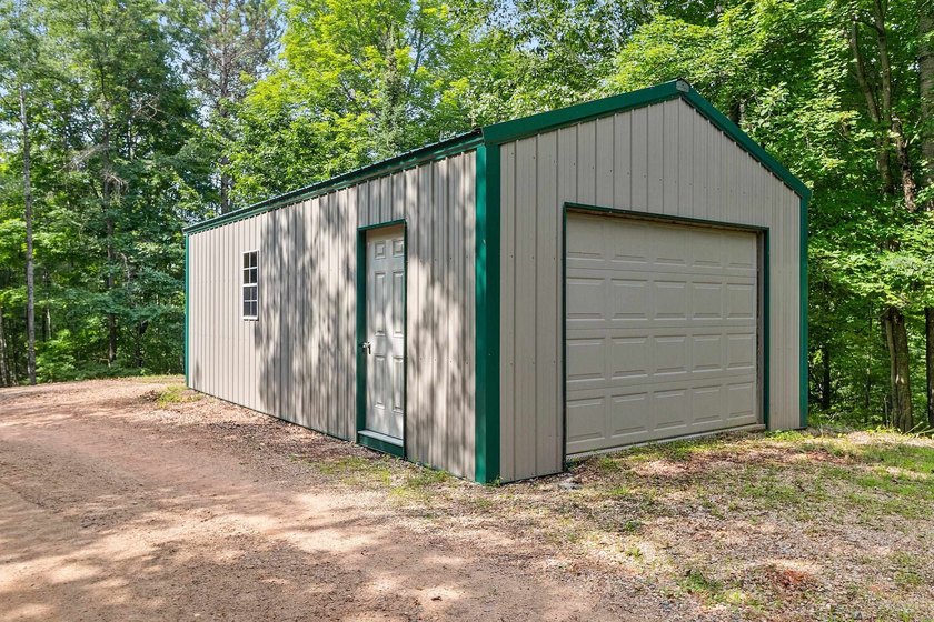 Experience true Northwoods living in this beautiful full log - photo 6