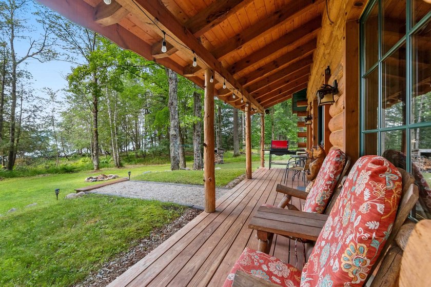 Experience true Northwoods living in this beautiful full log - photo 8