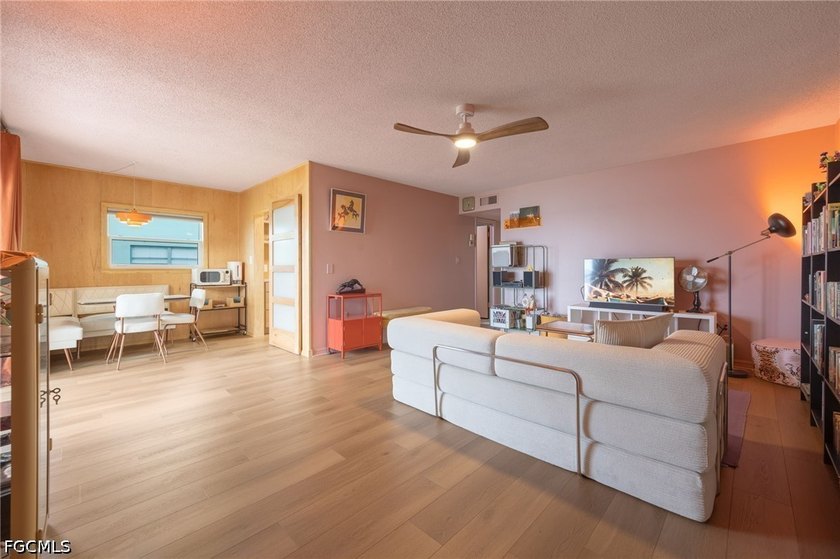 Discover serene riverfront living in this completely renovated - photo 3