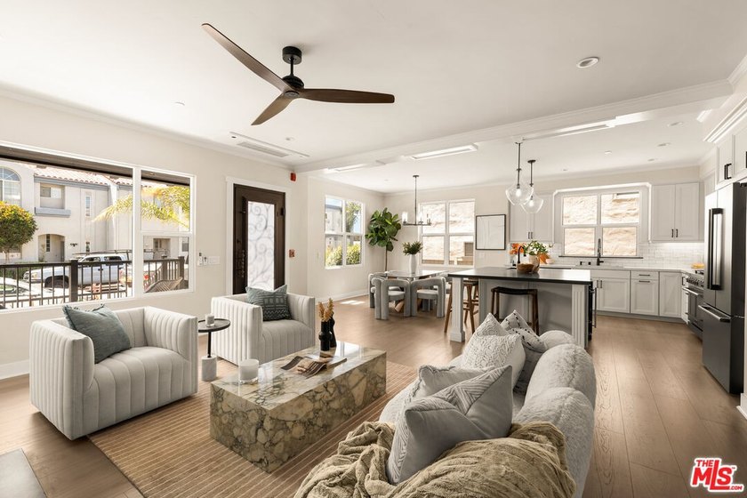Experience refined coastal living in this new construction just - photo 2