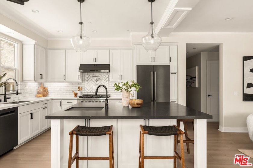 Experience refined coastal living in this new construction just - photo 3