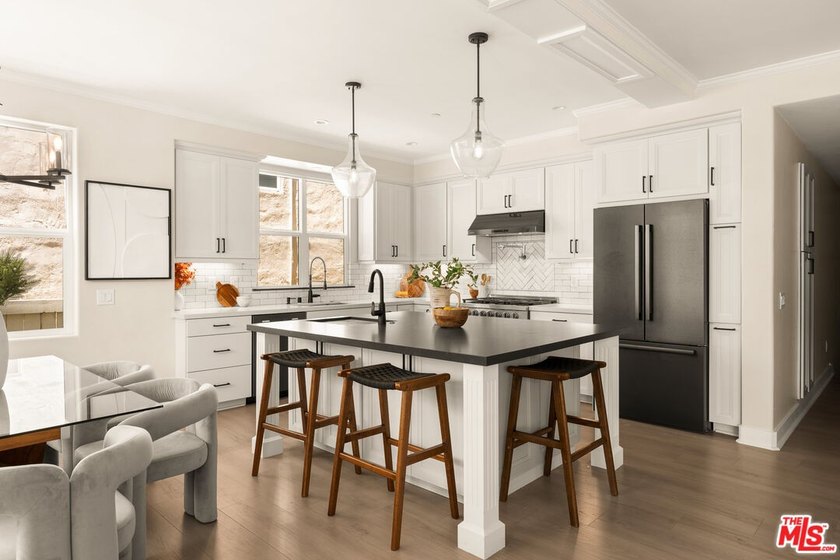 Experience refined coastal living in this new construction just - photo 4