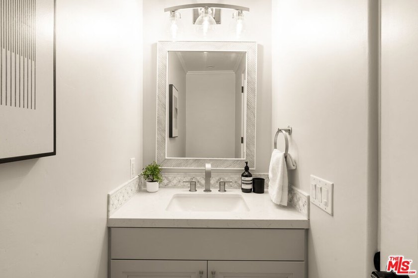 Experience refined coastal living in this new construction just - photo 7