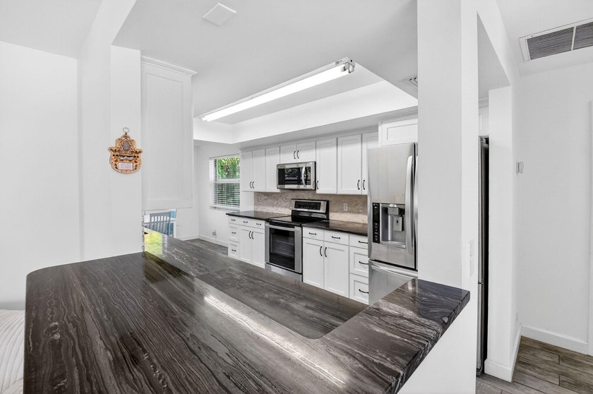Discover the ultimate coastal lifestyle at 3651 Palm Drive in - photo 24