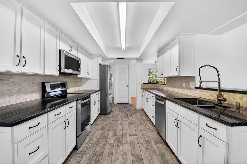 Discover the ultimate coastal lifestyle at 3651 Palm Drive in - photo 25