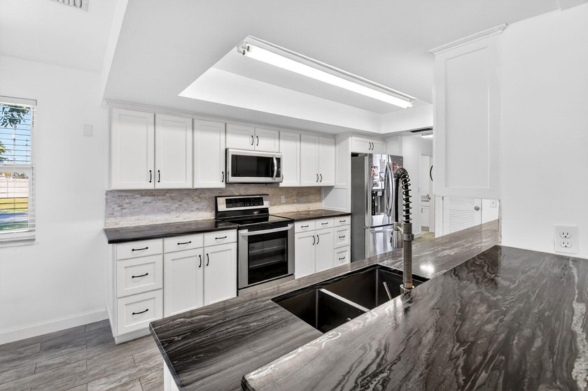 Discover the ultimate coastal lifestyle at 3651 Palm Drive in - photo 26